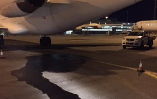 emergency oil spill at perth airport- wa sweeping and scrubbing